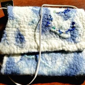 Hand felted clutch purse.